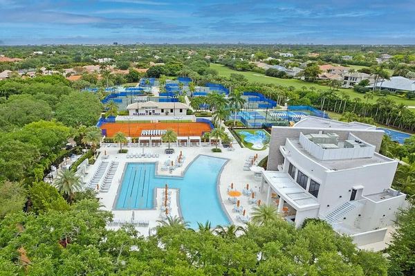 Aerial view of the clubhouse pool complex and courts